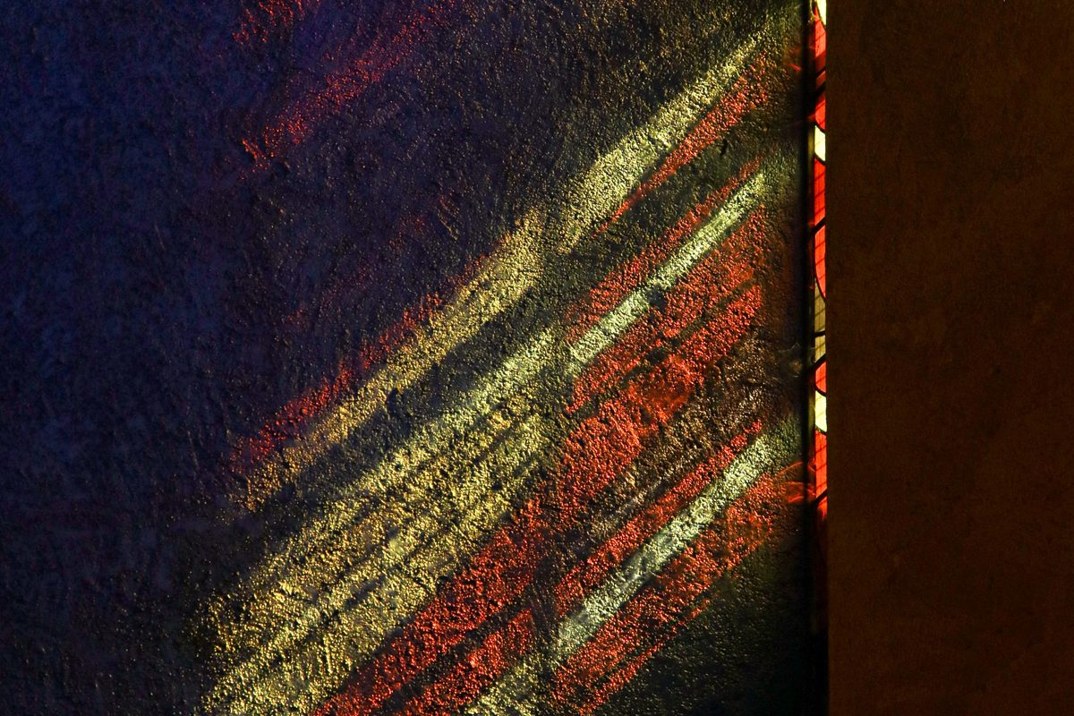 beam of light from the stained glass windows at the Church of Reconciliation